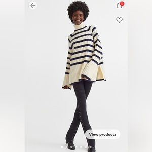 Rib knit striped turtleneck sweater